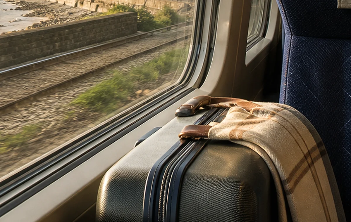 Railway view from a train window for UK travel contact enquiries